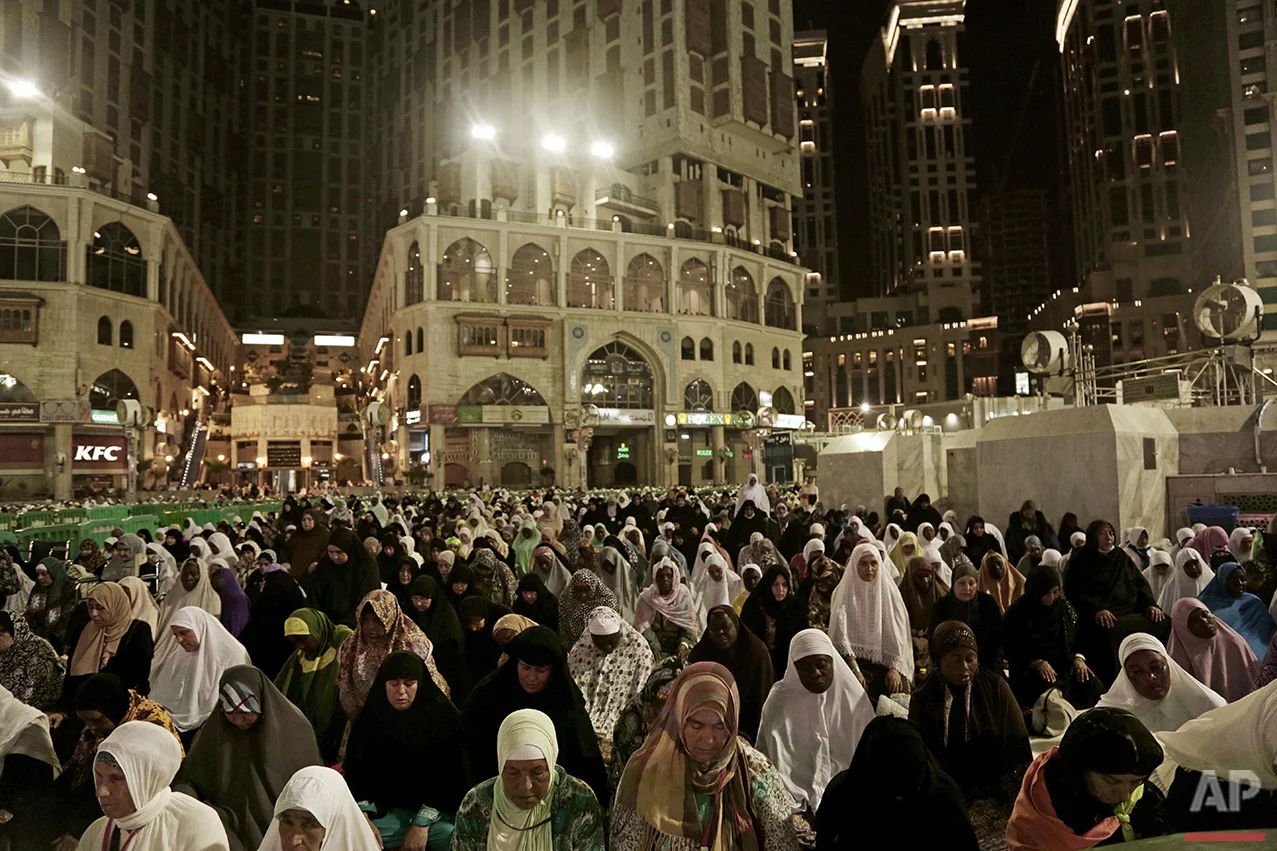  Muslim pilgrims pray Fajr, prayer before sunrise, outside the Grand Mosque in the Muslim holy city of Mecca, Saudi Arabia, Thursday, Sept. 8, 2016. Millions of pilgrims have arrived to Mecca ahead of the Hajj annual pilgrimage which begins Saturday,