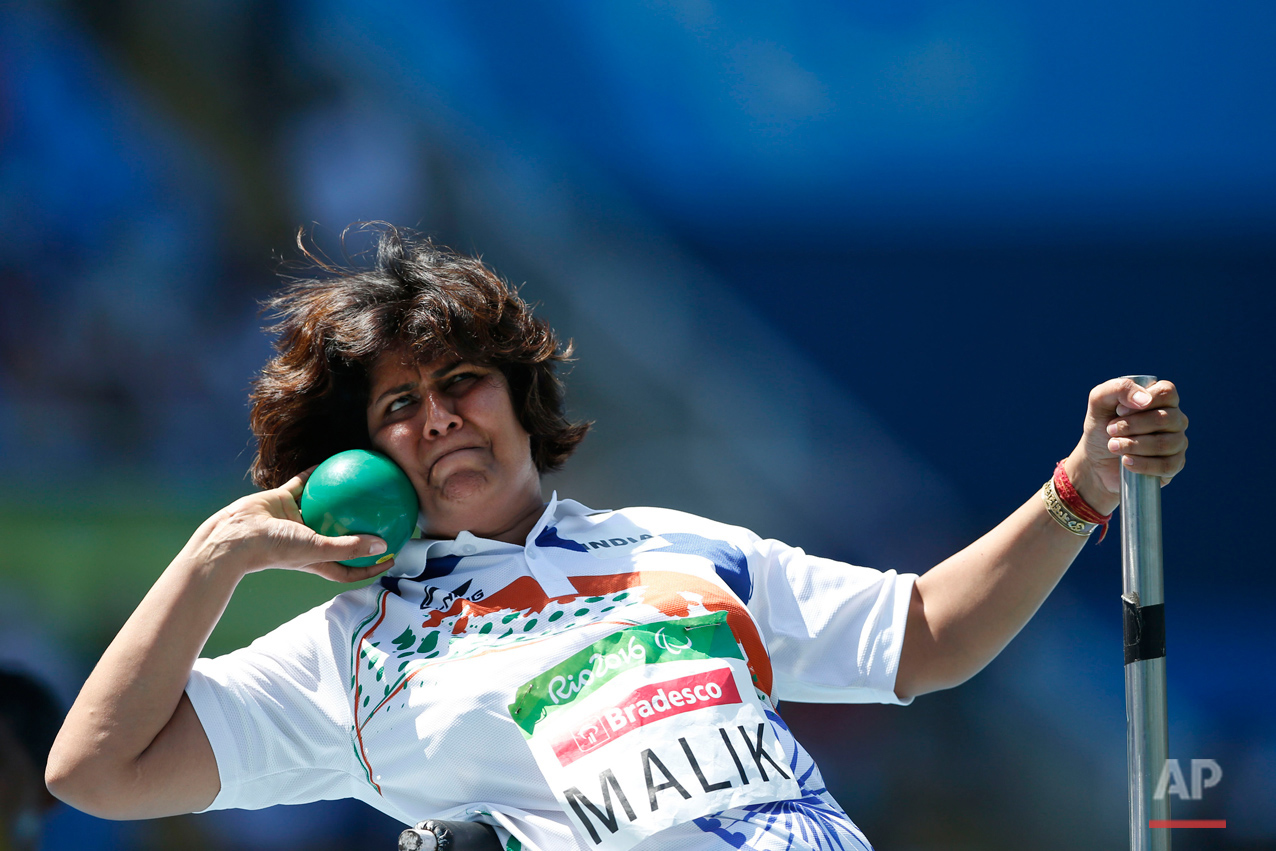 India's Deepa Malik competes to win the silver in the women's final shot put F53 athletics event during the Paralympic Games at Olympic Stadium in Rio de Janeiro, Brazil, Monday, Sept. 12, 2016. (AP Photo/Mauro Pimentel) 