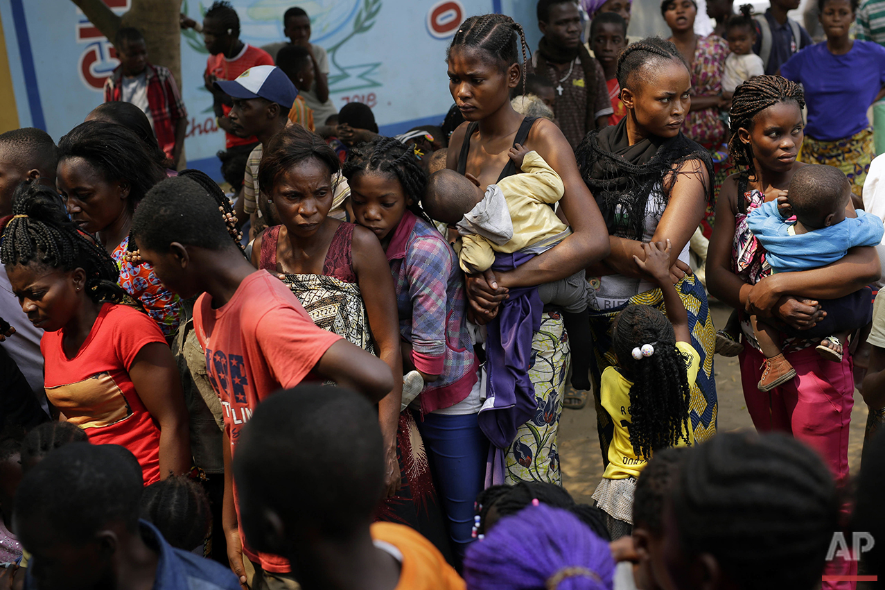  In this photo taken Thursday July 21, 2016, residents of the Kisenso district of Kinshasa, line up to receive a yellow fever vaccine. (AP Photo/Jerome Delay) 