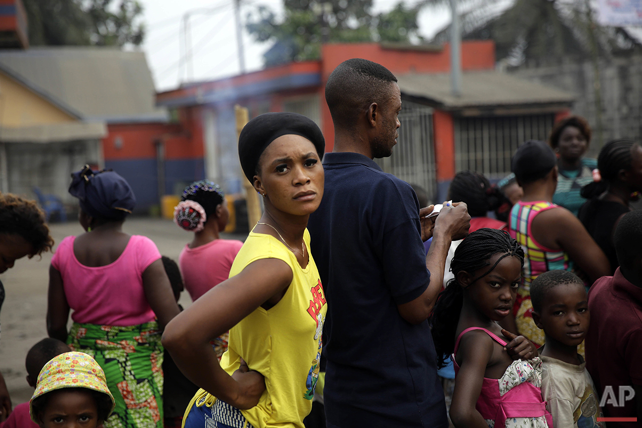  In this photo taken Thursday July 21, 2016, residents of the Kisenso district of Kinshasa, line up to receive a yellow fever vaccine. (AP Photo/Jerome Delay) 