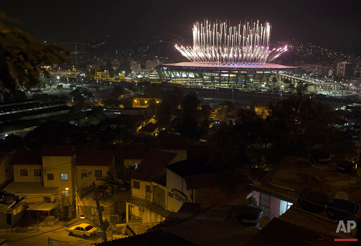  Fireworks explode above the Maracana stadium during the opening ceremony of the Rio's 2016 Summer Olympics in Rio de Janeiro, Brazil, Friday, Aug. 5, 2016. (AP Photo/Leo Correa) 