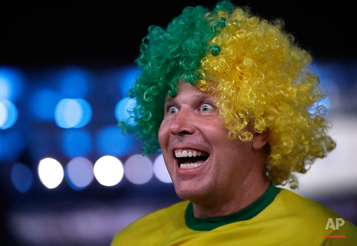 Giorgio Licitra of Italy enjoys the festivities at the opening ceremony for the 2016 Summer Olympics in Rio de Janeiro, Brazil, Friday, Aug. 5, 2016. (AP Photo/Robert F. Bukaty)