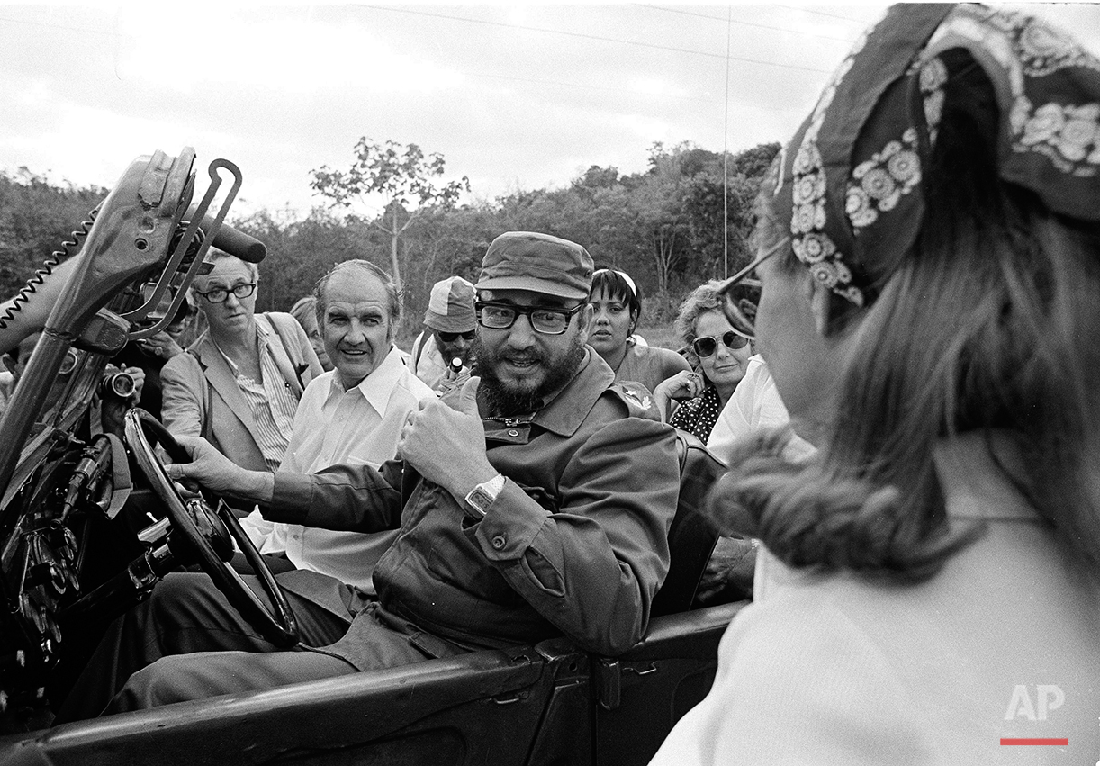  South Dakota Senator George McGovern goes for a jeep ride with Cuban Premier Fidel Castro, behind the wheel, during the senator's visit to Cuba, May 8, 1975.  (AP Photo/Charles Tasnadi) 