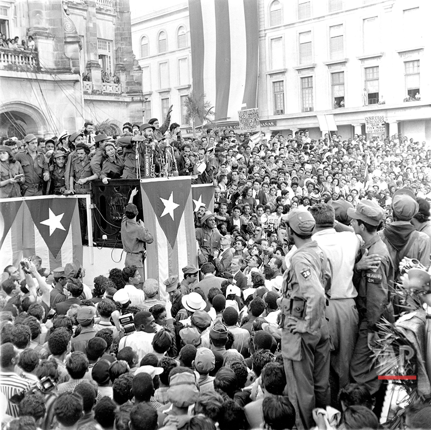  Fidel Castro gestures as he addresses a crowd of several hundred thousand persons gathered in the park in front of the presidential palace in Havana, Cuba, in Jan. 1959. &nbsp;(AP Photo/Harold Valentine) 