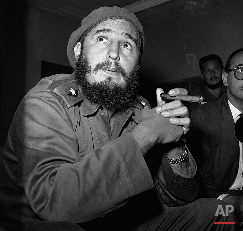  In this June 14, 1961 photo, Prime Minister Fidel Castro holds a cigar during a news conference in Havana, Cuba. For over half a century, the U.S. government tried many schemes to overthrow the Castro regime: poisonous cigars, an exploding seashell,