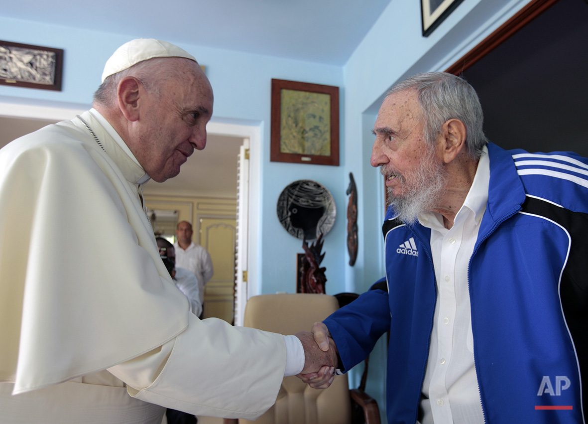  Pope Francis and Cuba's Fidel Castro shake hands, in Havana, Cuba, Sunday, Sept. 20, 2015. (AP Photo/Alex Castro) 