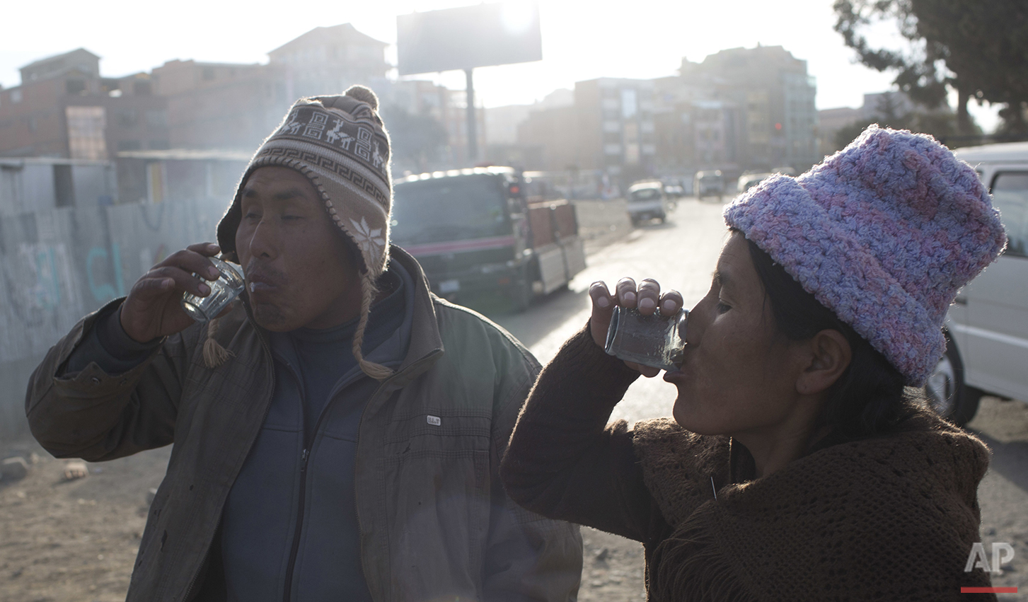 In this June 8, 2016 photo, Lorenzo Saldias and his wife drink donkey milk from a vendor in the streets of El Alto, Bolivia. "Donkey milk is medicine that heals," Salvias said. "I had pneumonia, my back hurt and I had the chills. Now it's taking eff