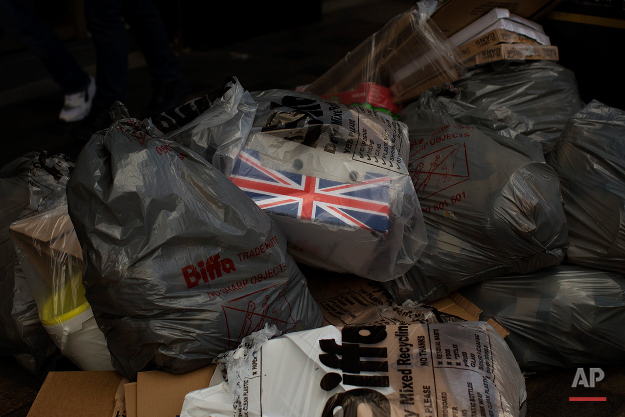  In this Saturday, July 2, 2016 photo, a box decorated with a Great Britain's union flag lays inside a rubbish bag in downtown Glasgow, Scotland. In one of the defining splits of last week’s EU referendum, all 32 council areas in Scotland as well as 
