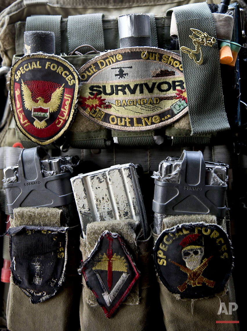  Patches and a Shiite pin adorn the body armor belonging to a soldiers from Iraq's elite counterterrorism forces during a military operation to oust the Islamic State group from Fallujah, Iraq. A senior Iraqi commander declared that the city of Fallu