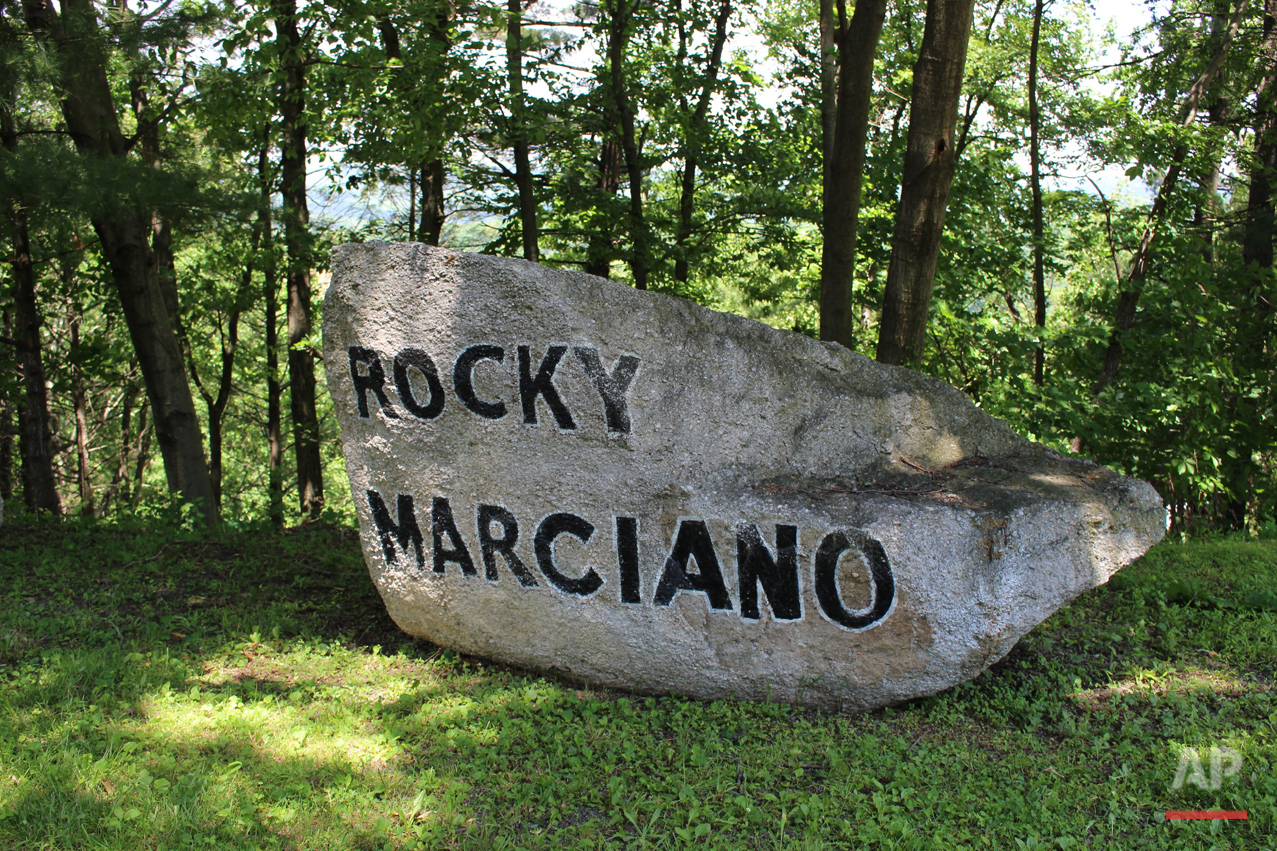  In this photo taken Monday, June 6, 2016, a boulder bearing the name of famed boxer Rocky Marciano is seen outside  Muhammad Aliís training camp in Deer Lake, Pa. Since Aliís death at 74, residents have been coming to the rustic hilltop camp to pay 