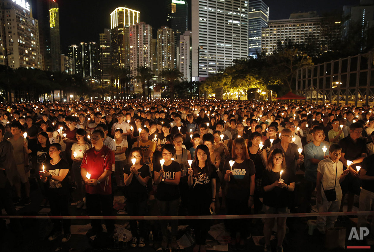  Tens of thousands attend a candlelight vigil at Victoria Park in Hong Kong, Saturday, June 4, 2016, to commemorate victims of the 1989 military crackdown in Beijing. China's bloody crackdown on the Tiananmen Square pro-democracy protests was a pivot