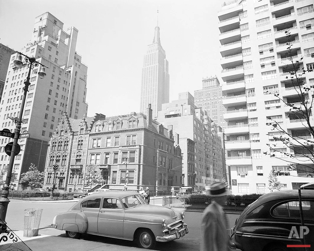 The Empire State Building is seen from from the corner of Park Avenue and 36th Street in New York, May 31, 1951. (AP Photo/Bob Wands)