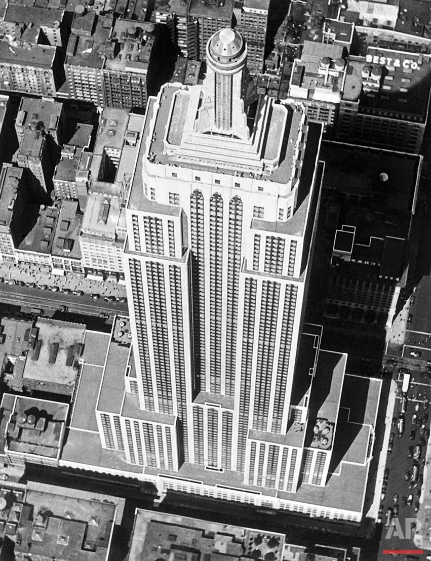 When seen from the air, this monarch of all the world's large buildings, the Empire State Building, located on Fifth Avenue in New York, scarcely looks its full height of 1250 feet, on Sept. 12, 1938. The Empire State has 102 floors, the last 16 being in the observation tower. (AP Photo)