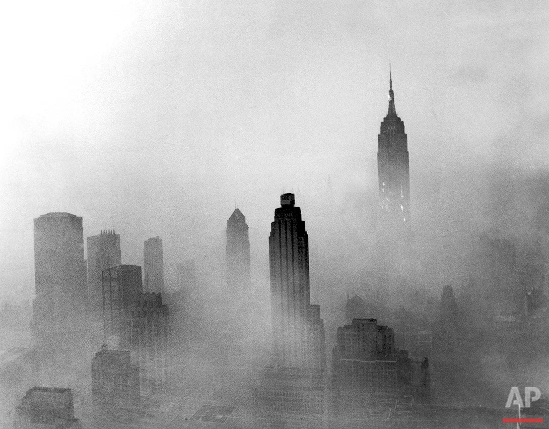 The Empire State Building is visible in a hazy New York City skyline, circa 1969-1970. (AP Photo/Eddie Adams)