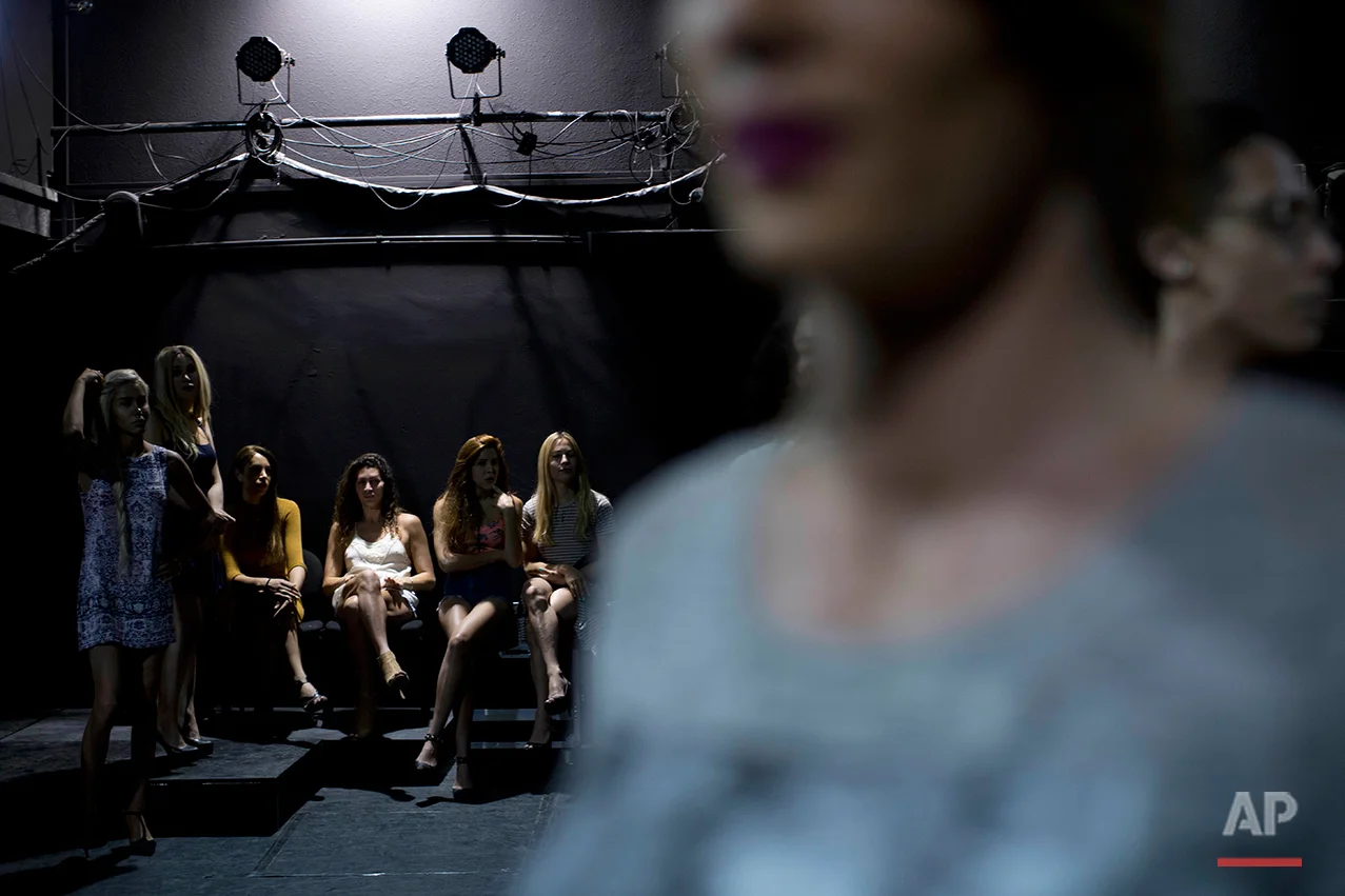  In this Tuesday, May 24, 2016 photo, contestants in the first Miss Trans Israel beauty pageant, practice the walk on the stage during rehearsal in Tel Aviv, Israel. The pageant will be held at HaBima, Israel's national theater, in Tel Aviv on Friday
