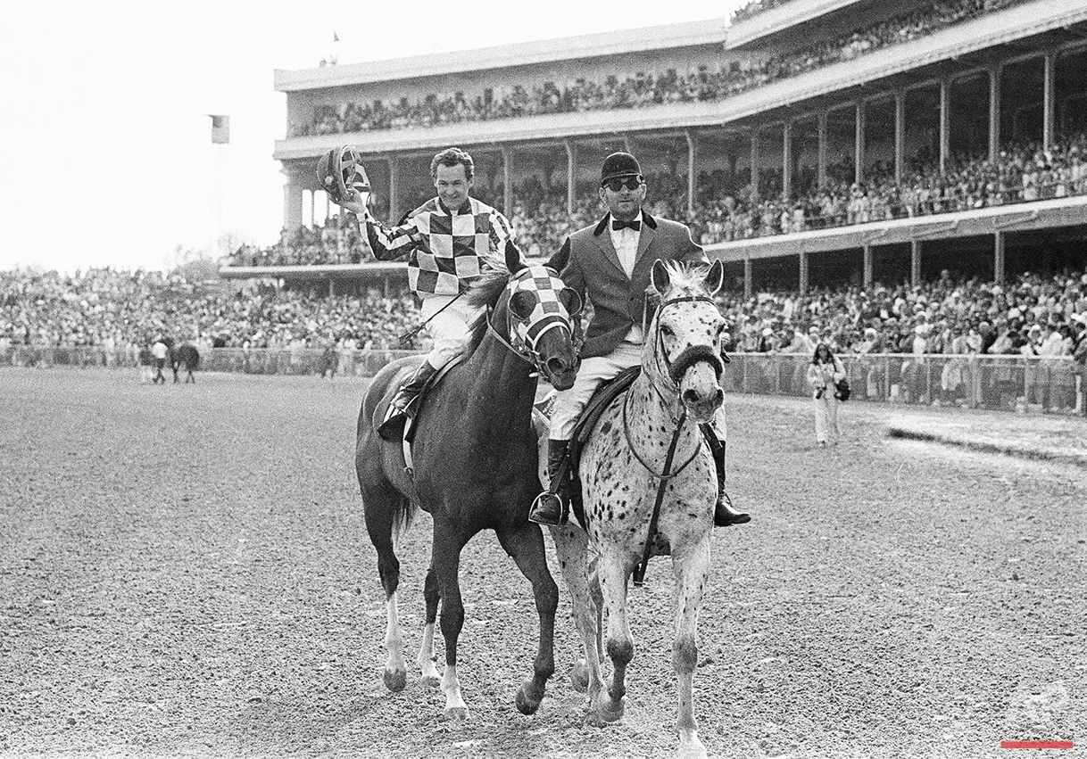Jockey Ron Turcotte in Winner's Circle at Churchill Downs in Louisville, Ky., May 5, 1973, after Turcotte rode Secretariat to a record win in the 99th Kentucky Derby. (AP Photo)