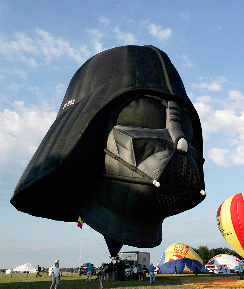  A hot air balloon shaped as the Darth Vader character of the Star Wars movie inflates during the annual Quik Chek New Jersey Festival of Ballooning at Solberg Airport  in Readington, N.J., Friday, July 25, 2008. The  hot air ballooning festival cont