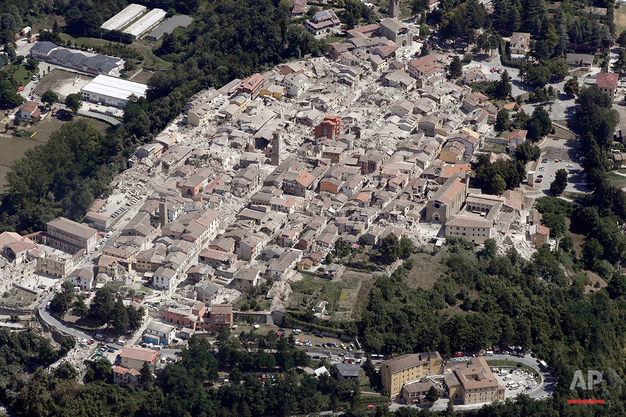  This aerial photo shows the damaged buildings in the historical part of the town of Amatrice, central Italy, after an earthquake, Aug. 24, 2016. &nbsp;(AP Photo/Gregorio Borgia) 