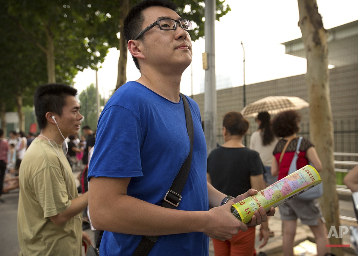 Sam Wang, 20, a university student, stands outside the U.S. embassy in Beijing on Friday, July 29, 2016. "America is a country that produces a massive amount of cultural output such as Hollywood movies, music and many other (forms of) entertainment,