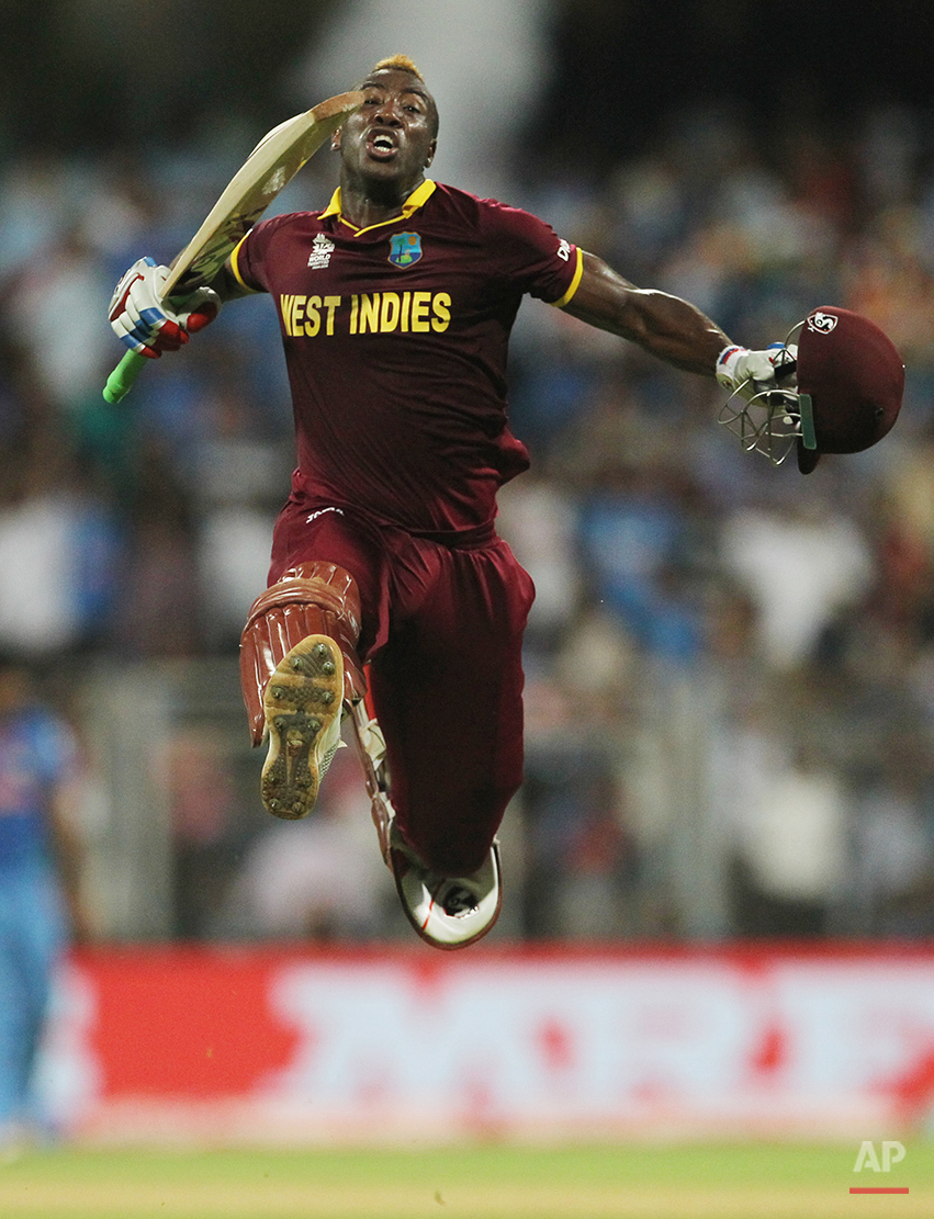  West Indies Andre Russell celebrates after his team's seven wicket win over India during their ICC World Twenty20 2016 cricket semifinal match at Wankhede stadium in Mumbai, India,Thursday, March 31, 2016.(AP Photo/Rafiq Maqbool) 