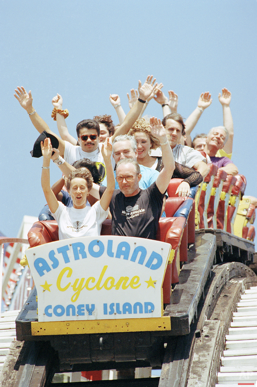  Jackqueline and Barry Norman, foreground, of England, join members of the American Coaster Enthusiasts for a ride on the Cyclone roller coaster at Astroland Park in Coney Island, in the Brooklyn borough of New York, Aug. 30, 1992. (AP Photo/Alex Bra