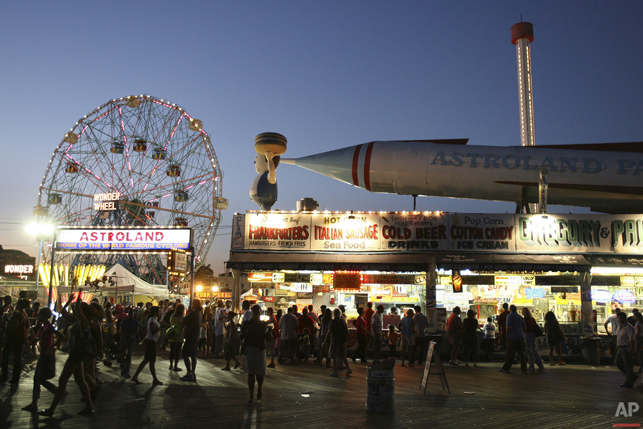  The entrance to Astroland Park is seen from the boardwalk at night at Coney Island, N.Y., Sunday, Sept. 7, 2008.  (AP Photo/Seth Wenig) 