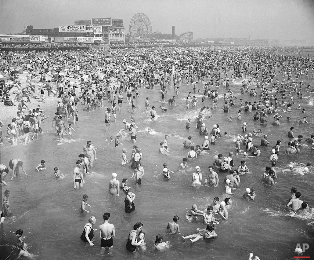  This general view from the Steeplechase Pier shows part of the crowded beach at Coney Island in Brooklyn, N.Y., Aug. 28, 1948. (AP Photo) 