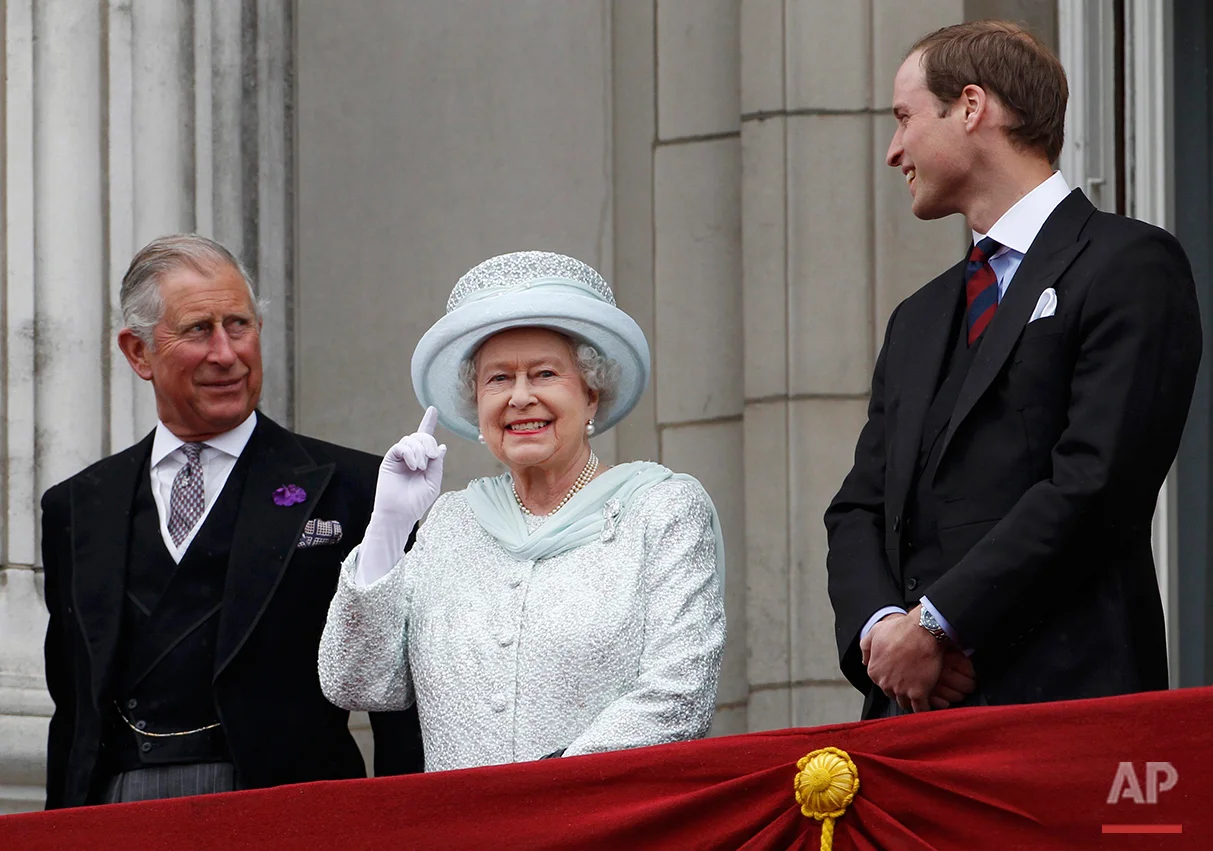 Britain's Prince Charles, Britain's Queen Elizabeth II and Prince William stand on the balcony at Buckingham Palace during the Diamond Jubilee celebrations in central London Tuesday June 5, 2012. Four days of nationwide celebrations during which millions of people have turned out to mark the Queen's Diamond Jubilee conclude on Tuesday with a church service and carriage procession through central London. (AP Photo/Stefan Wermuth, Pool)