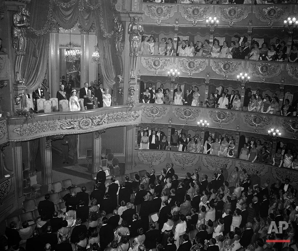 The royal box containing Queen Elizabeth II of Great Britain, the Duke of Edinburgh and President Francisco Craveiro Lopes, and his wife Berta, of Portugal inside the Sao Carlos Opera House, in Lisbon, Portugal, on Feb. 19, 1957. The British royal couple were attending a gala performance in their honour, held on this the second day of their state visit to Portugal. (AP Photo)