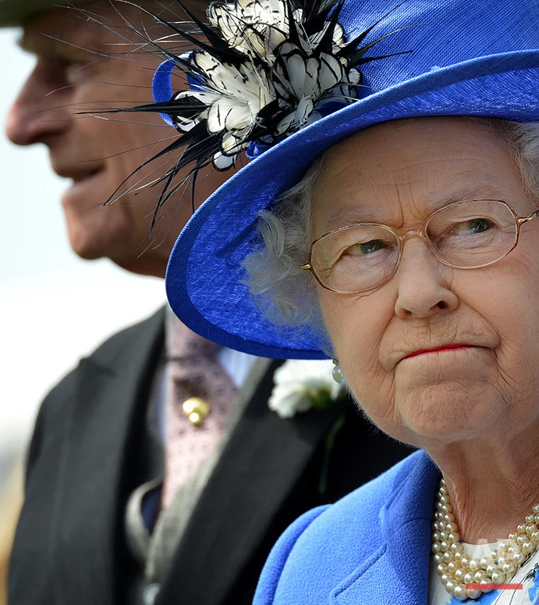 Britain's Queen Elizabeth II and Prince Philip, left, inspect the horses in the parade ring before the Derby race at Epsom Derby, Epsom, southern England, Saturday June 2, 2012 the first official day of the Queen's Diamond Jubilee celebrations. Britain is marking Queen Elizabeth II's 60 years on the throne with a four-day holiday weekend of ceremony, symbolism and street parties. (AP Photo/Ben Stansall, Pool)