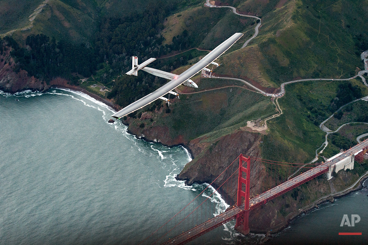  Solar Impulse 2 flies over the Golden Gate Bridge in San Francisco, Saturday, April 23, 2016. The solar-powered airplane, which is attempting to circumnavigate the globe to promote clean energy and the spirit of innovation, arrived from Hawaii after