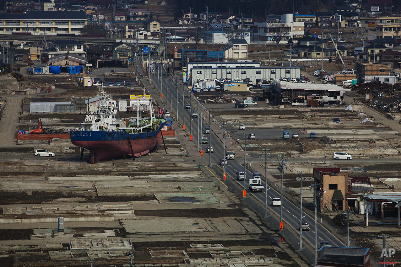  In this Feb. 23, 2012 photo, a ship sits in a destroyed residential neighborhood in Kesennuma, Japan. A year after an earthquake and tsunami ravaged the country's coastline and killed around 19,000 people, many of the boats carried inland by the wal
