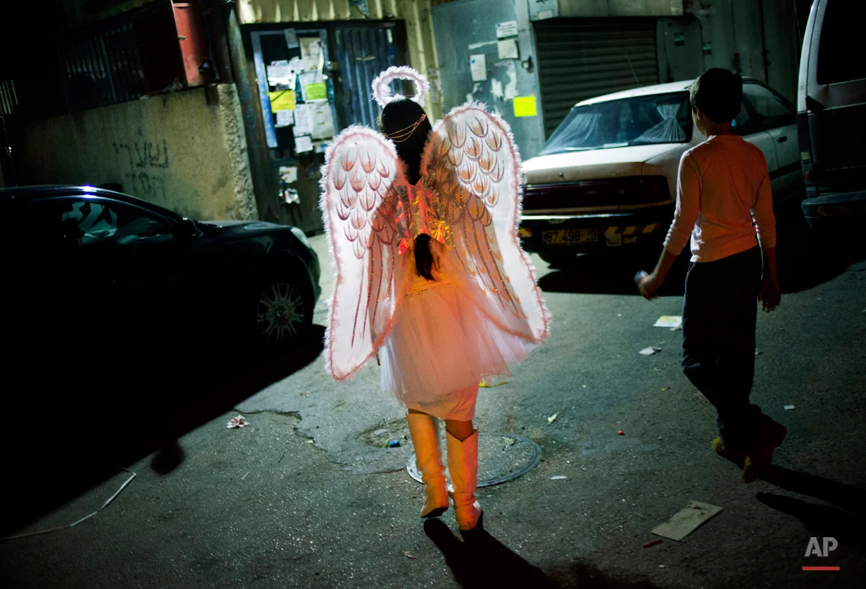 APTOPIX Mideast Israel Purim