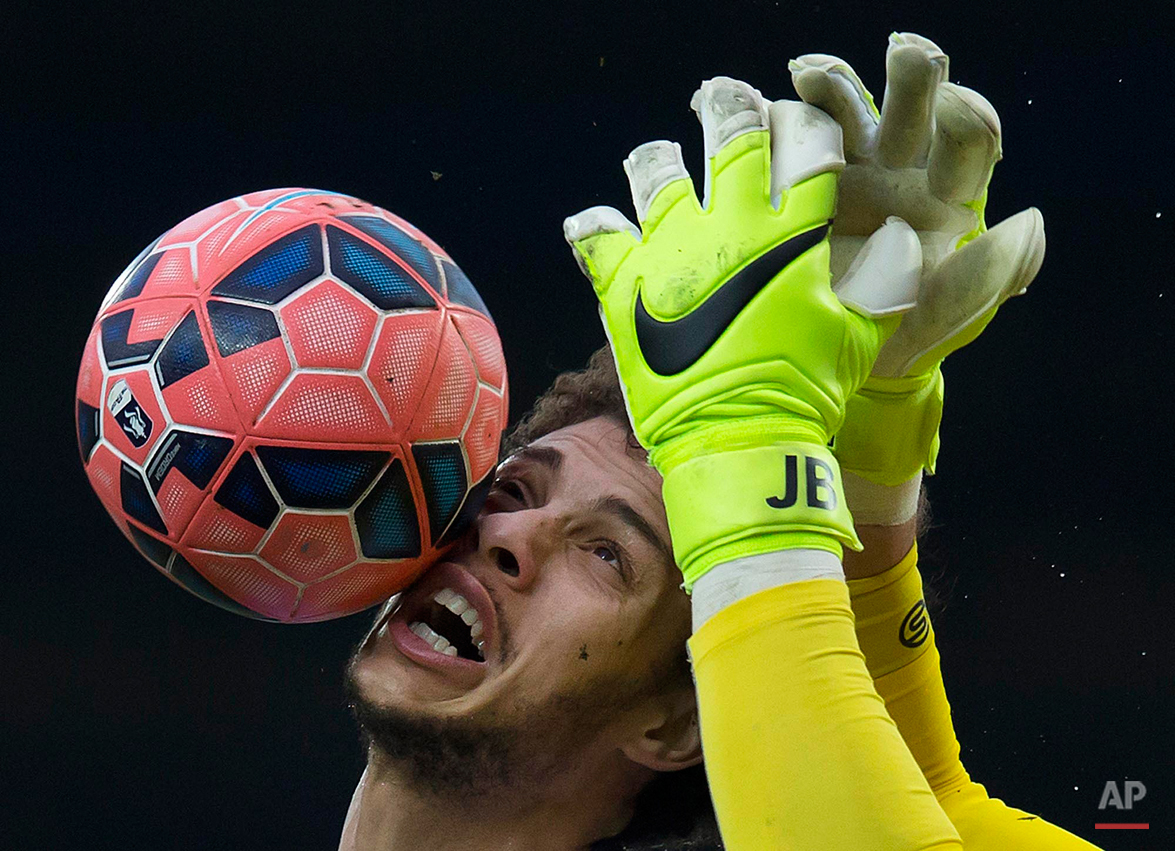  In this Saturday, Feb. 14, 2015 photo, Blackburn's Rudy Gestede, left, in action against Stoke's goalkeeper Jack Butland during the English FA Cup fifth round soccer match between Blackburn and Stoke at Ewood Park Stadium, Blackburn, England. (AP Ph