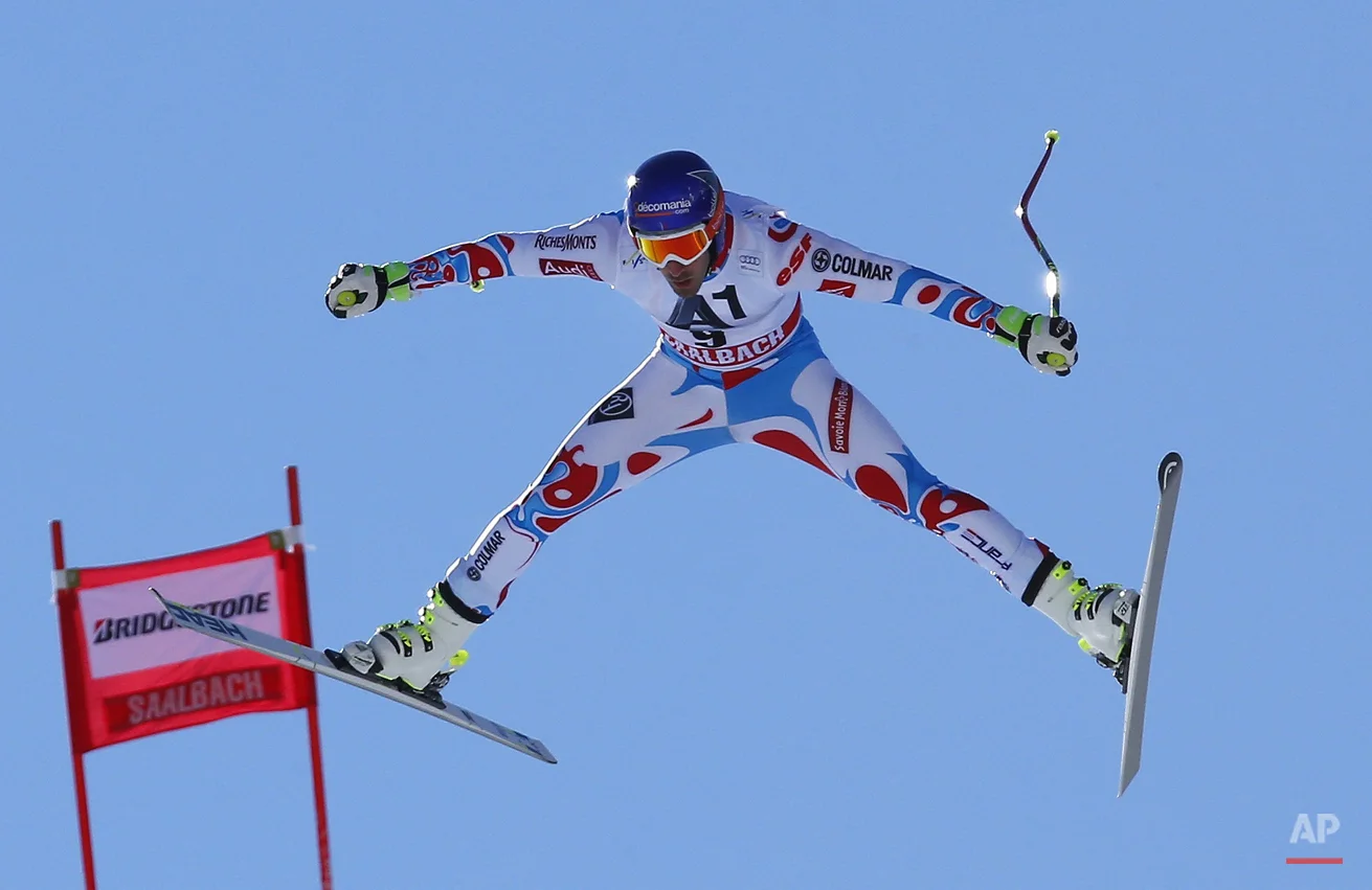 In this Feb. 20, 2015 photo, Adrien Theaux, of France, is airborne during a men's World Cup downhill training session, in Saalbach Hinterglemm, Austria. (AP Photo/Giovanni Auletta, file)