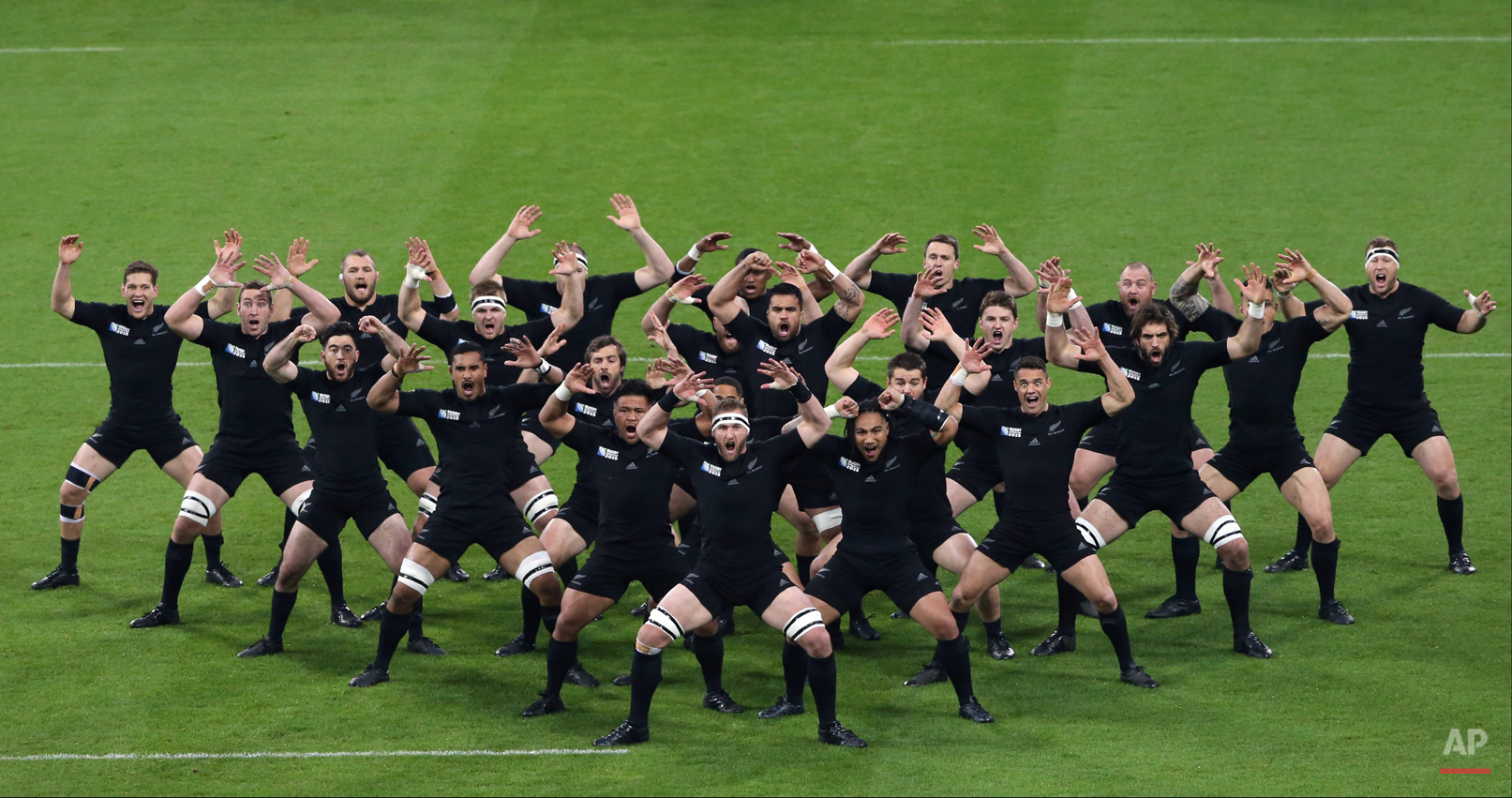  In this Oct. 9, 2015 photo, New Zealand players perform the haka before their Rugby World Cup Pool C match between New Zealand and Tonga at St James' Park, Newcastle, England.  (AP Photo/Scott Heppell) 