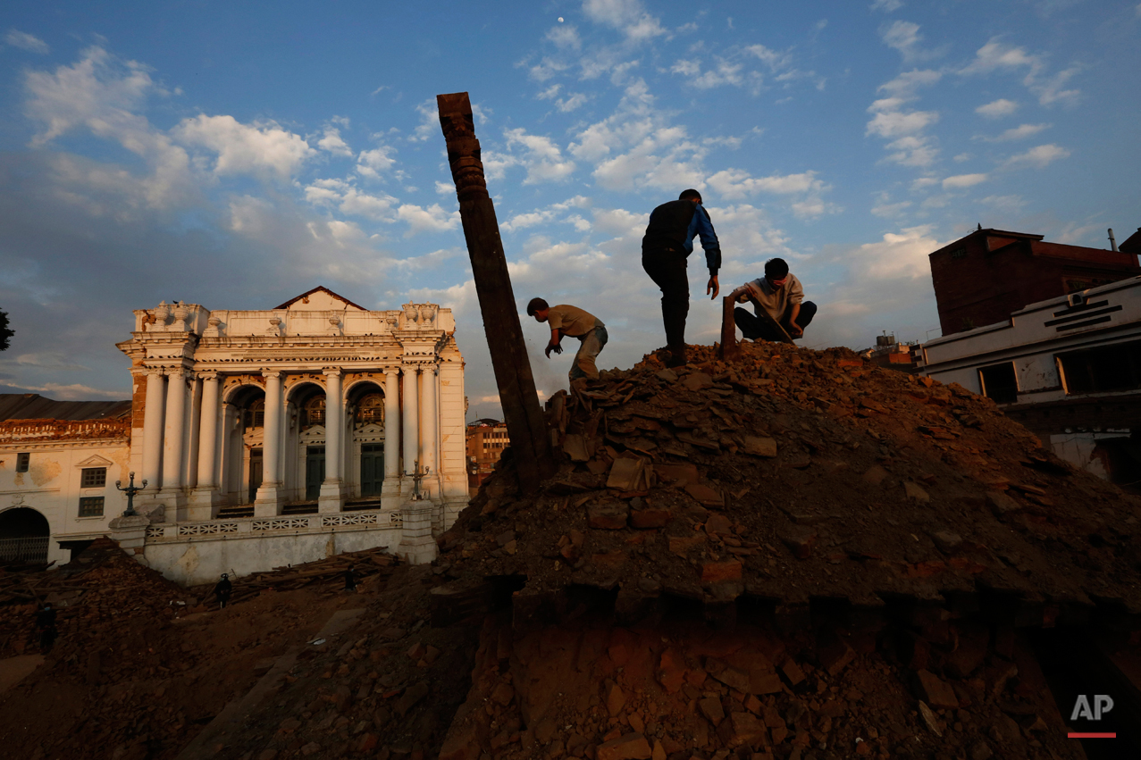  Nepalese students and volunteers clear the rubble at  Kathmandu Durbar Square, a UNESCO World Heritage Site, in Kathmandu, Nepal, Wednesday, April 29, 2015. A 7.8 magnitude earthquake shook Nepal???s capital and the densely populated Kathmandu valle