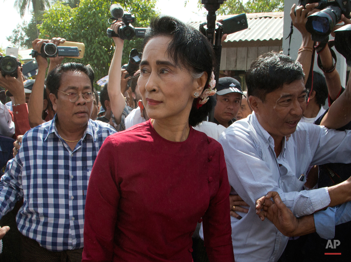  Leader of Myanmar's National League for Democracy party, Aung San Suu Kyi visits a polling station on the outskirts Yangon, Myanmar, Sunday, Nov. 8, 2015. Myanmar voted Sunday in historic elections that will test whether popular mandate will help lo