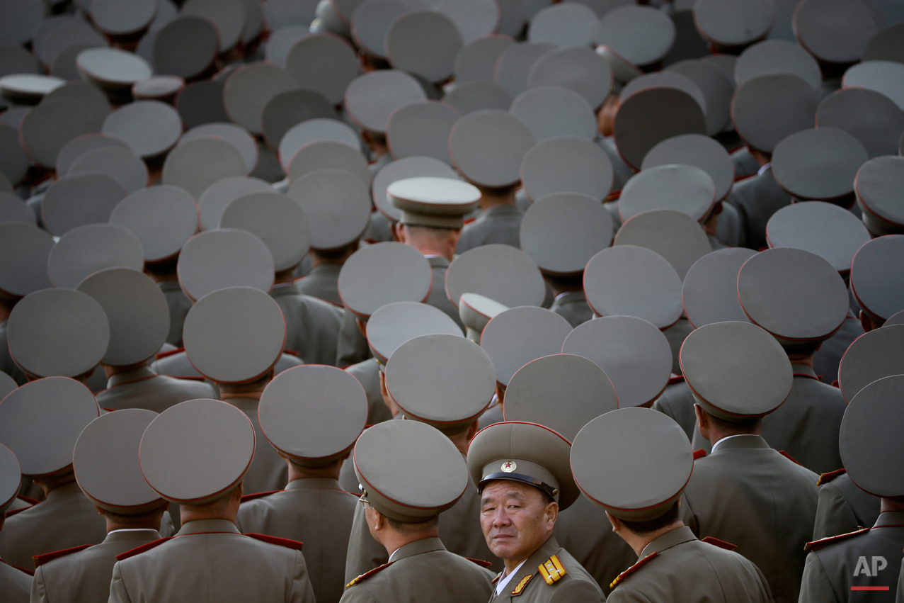  In this Oct. 10, 2015 photo, North Korean veterans gather before the start of a parade in Pyongyang, North Korea. North Korean leader Kim Jong Un declared Saturday that his country was ready to stand up to any threat posed by the United States as he