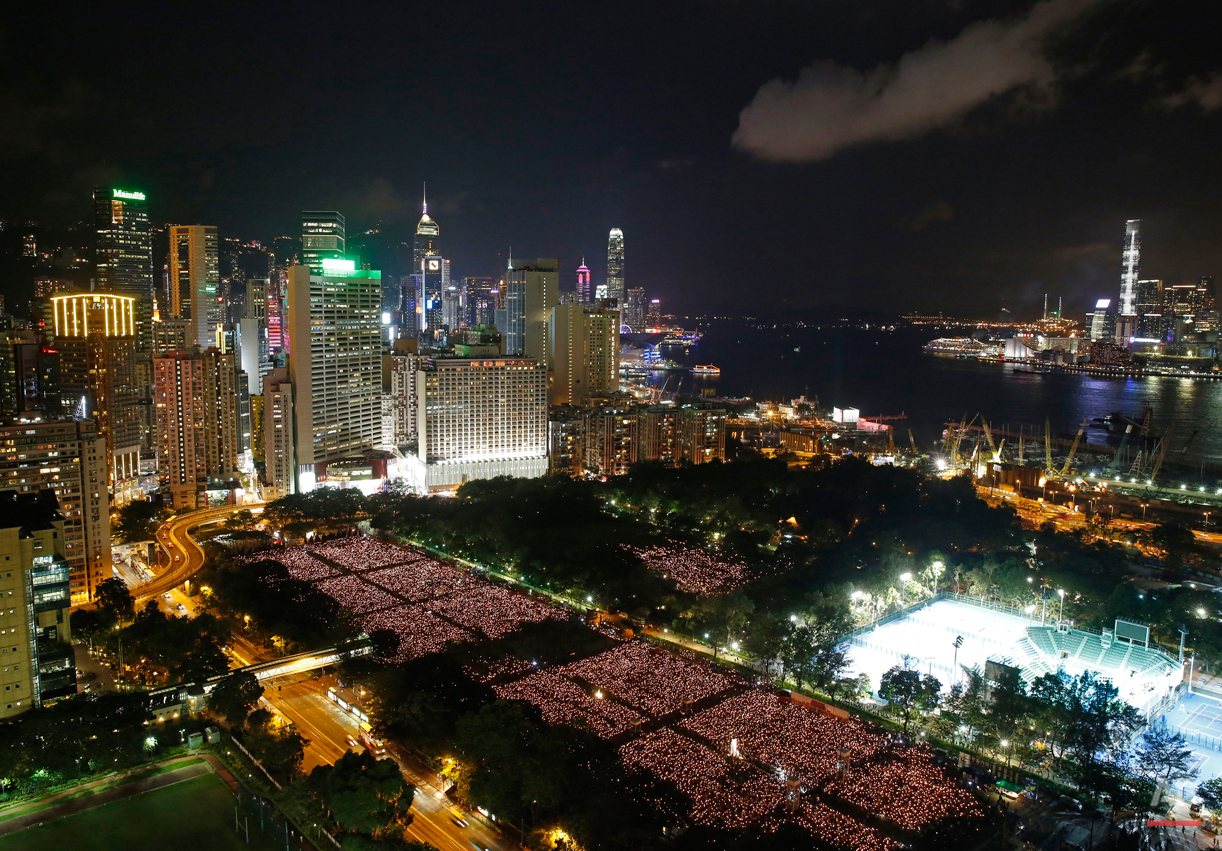  Tens of thousands of people attend a candlelight vigil at Victoria Park in Hong Kong on Thursday, June 4, 2015 to commemorate the 1989 student-led protests in Beijing's Tiananmen Square. (AP Photo/Kin Cheung) 