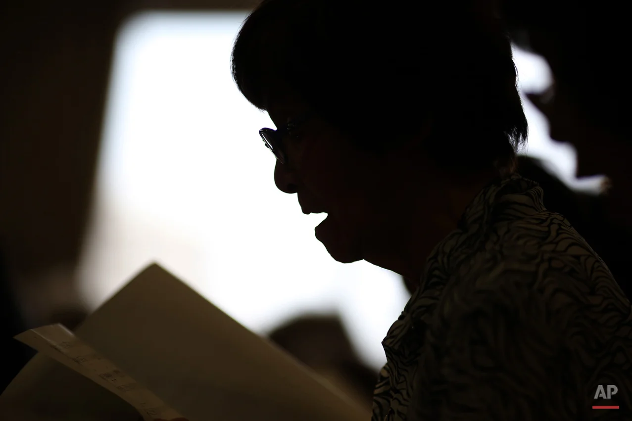  In this July 3, 2015 photo, Kimie Mihara, a survivor of the 1945 atomic bombing, participates a chorus at a community center in Hiroshima, Hiroshima Prefecture, southern Japan. On the morning of Aug. 6, 1945, the Atomic Bomb Dome, as it is known tod