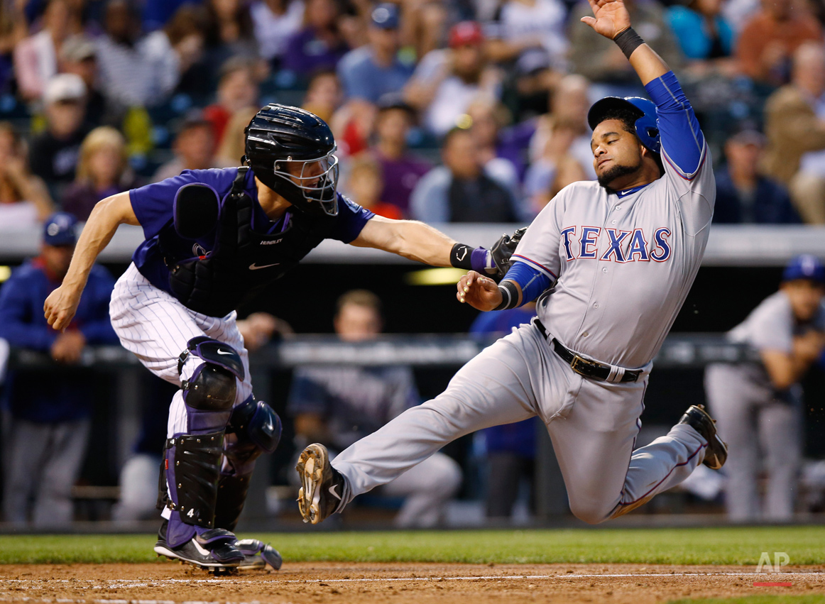 APTOPIX Rangers Rockies Baseball