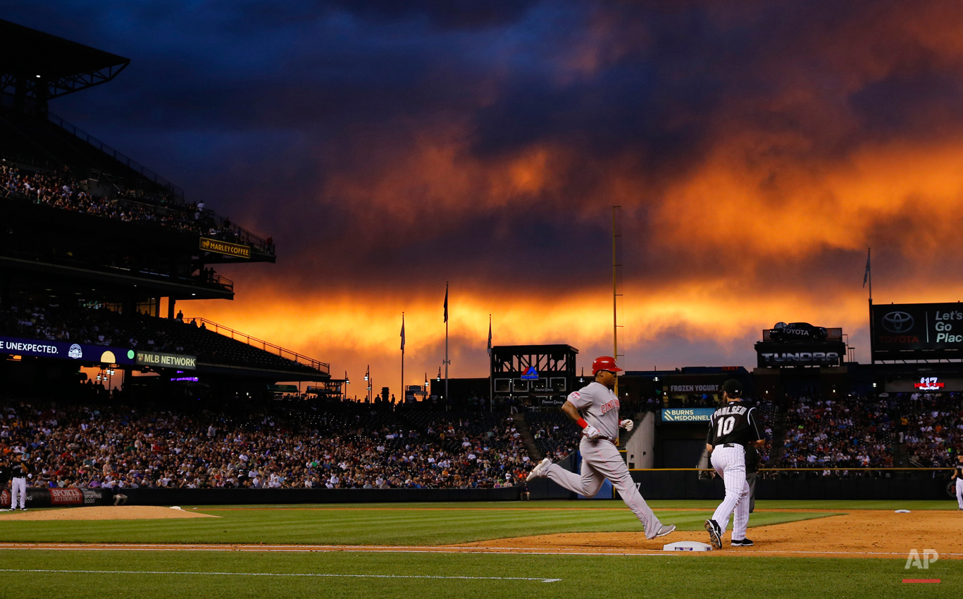 APTOPIX Reds Rockies Baseball