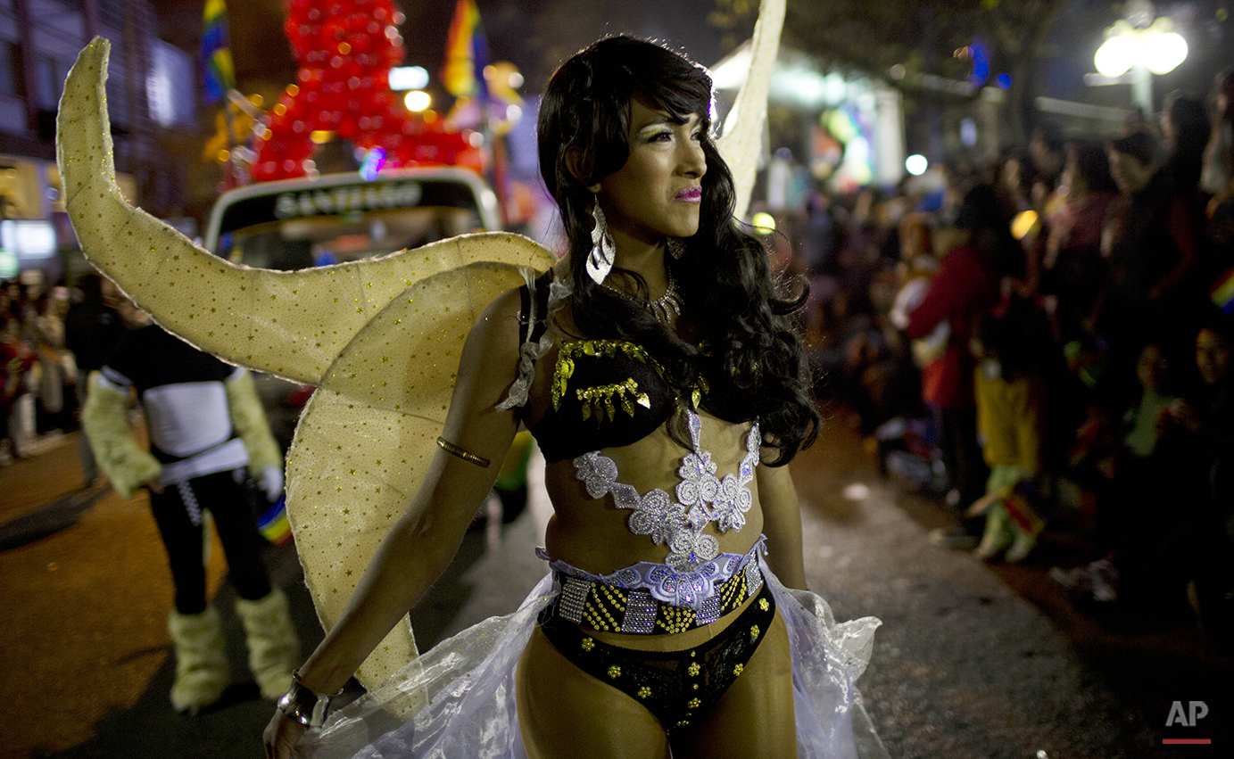  A reveler dressed as an angel participates in the annual gay pride parade in La Paz, Bolivia, Saturday, June 27, 2015. (AP Photo/Juan Karita) 