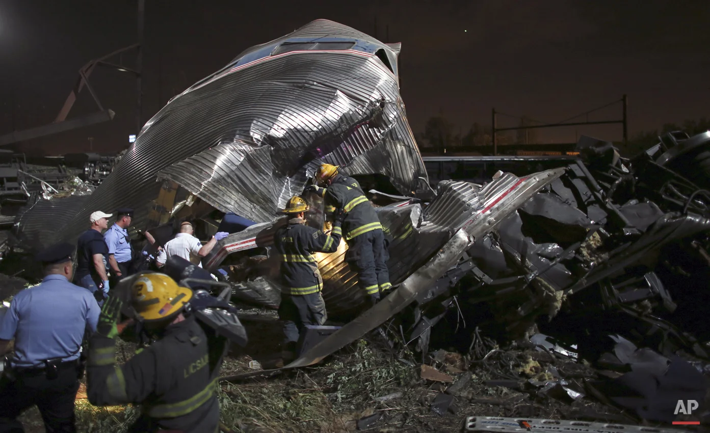  Emergency personnel work the scene of a Amtrak train wreck, Tuesday, May 12, 2015, in Philadelphia. (AP Photo/Joseph Kaczmarek) 