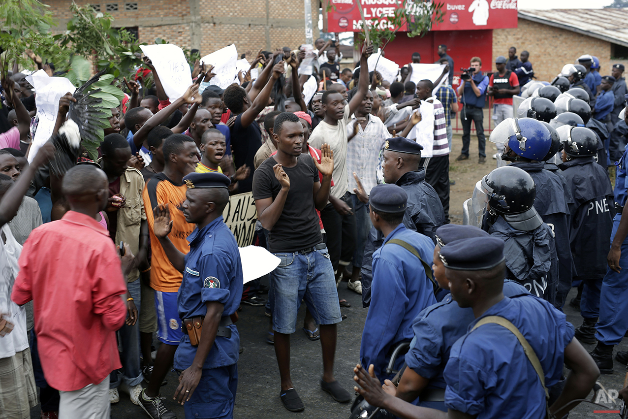  Demonstrators and police face off in Bujumbura, Burundi Thursday, April 30, 2015. Bujumbura has been hit by street protests since Sunday as the security forces confront demonstrators who say a third term for President Pierre Nkurunziza would violate
