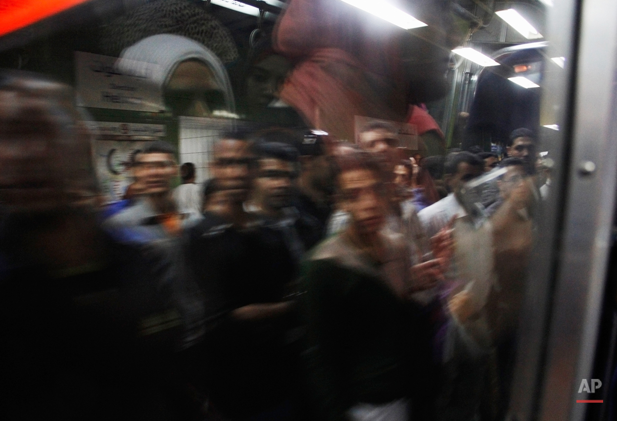 APTOPIX Mideast Egypt Subway Photo Essay