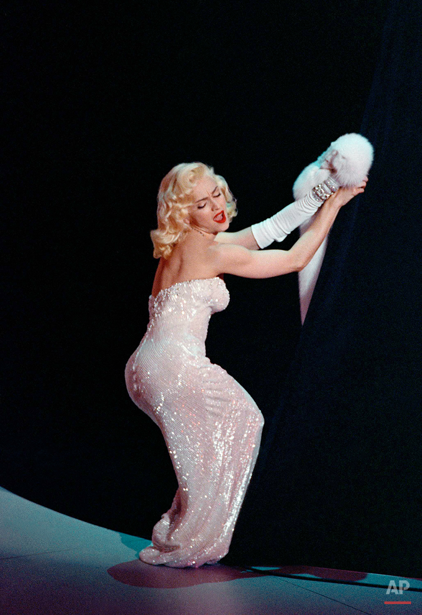  Madonna performs “Sooner or Later (I Always Get My Man)” from the film ?Dick Tracy? during the 63rd Annual Academy Awards show at the Shrine Auditorium at night on Monday, March 25, 1991 in Los Angeles. The song won an Oscar for best song. (AP Photo