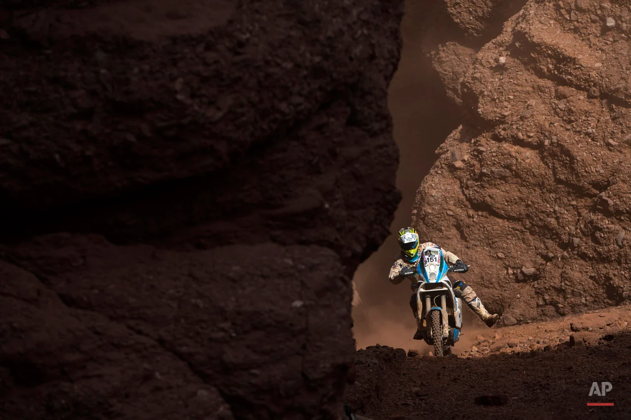 KTM rider Milan Engel of Czech Republic races through the Canyons during the eleventh stage of the Dakar Rally 2015 between the cities of Salta and Termas de Rio Hondo, Argentina, Thursday, Jan. 15, 2015. The race returned to Argentina after passing through Bolivia and Chile and will finish on Jan. 17 in Buenos Aires. (AP Photo/Felipe Dana)