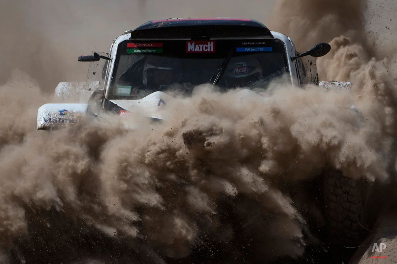 Buggy MD Rally driver Pascal Thomasse and co-pilot Pascal Larroque, both of France, race during the third stage of the Dakar Rally 2015 between the cities of San Juan and Chilecito, Argentina, Tuesday, Jan. 6, 2015. The race will finish on Jan. 17, passing through Bolivia and Chile and returning to Argentina. (AP Photo/Felipe Dana)